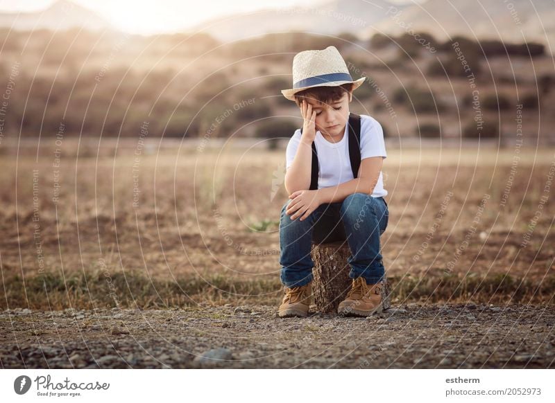 Little thoughtful boy - a Royalty Free Stock Photo from Photocase