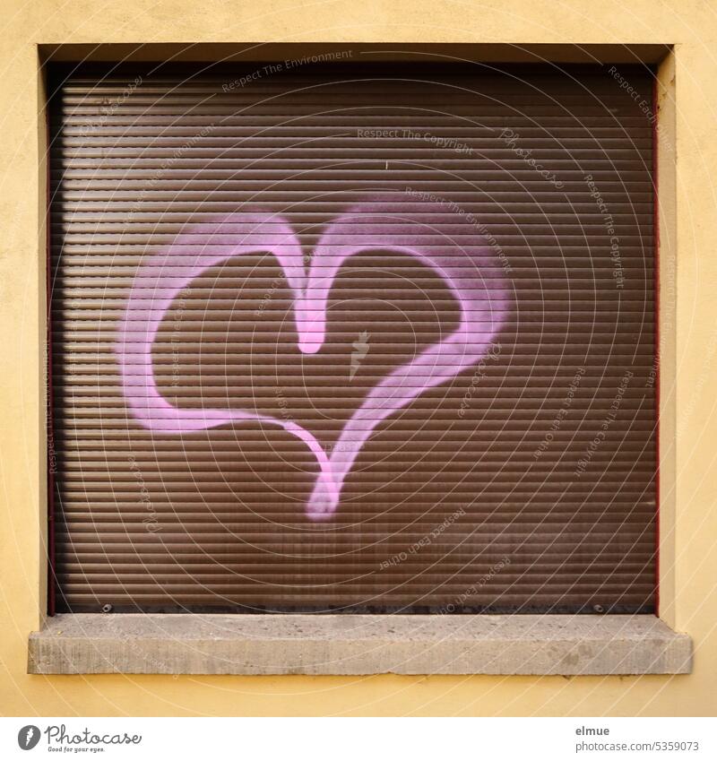 pink heart on brown window blind - a Royalty Free Stock Photo from