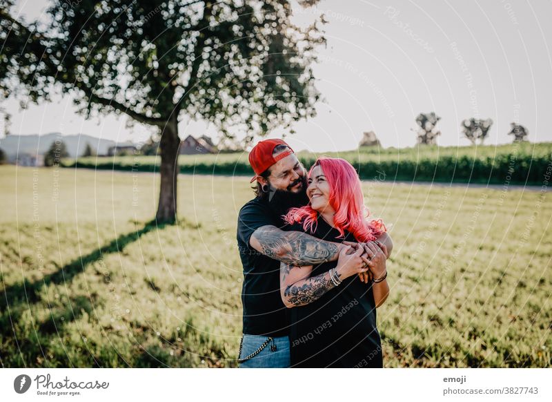 Closeup of a Tattooed Couple Holding Hands  Free Stock Photo