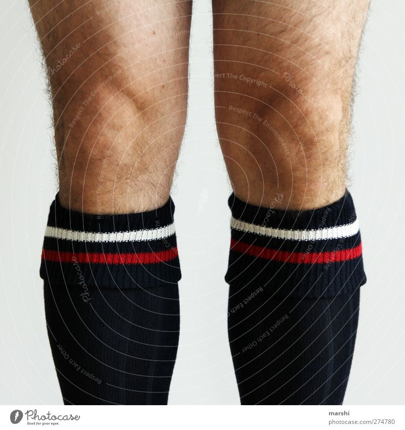 Men's Hairy Legs In Striped Socks, Top View Stock Photo, Picture