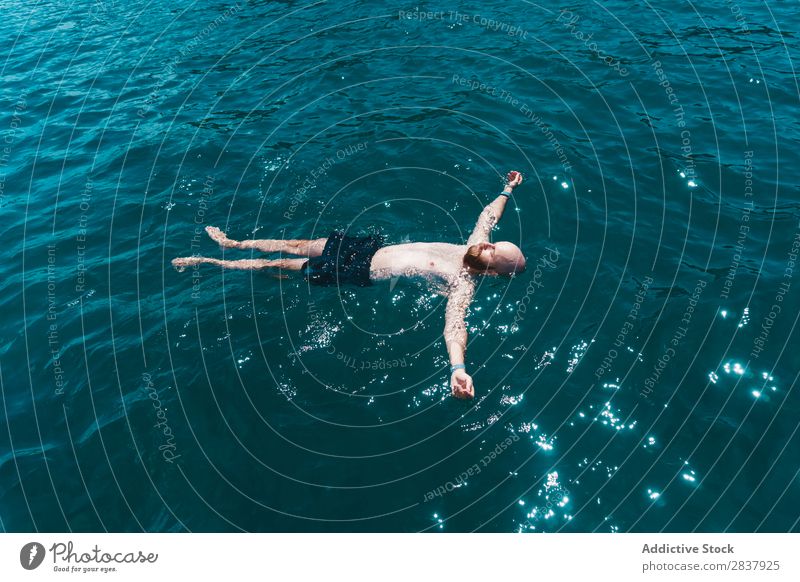 floating person in water