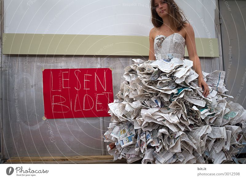 YOUNG FASHION DESIGNERS CREATE BEAUTIFUL DRESSES WITH NEWSPAPER
