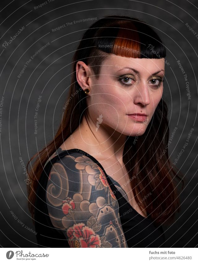 Closeup Portrait Of A Beautiful Woman With Tattoos On Her Arms Stock  Photo Picture And Royalty Free Image Image 200924235