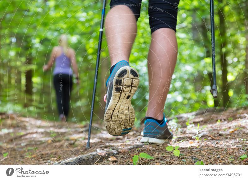 magasin Forbedring bånd Young couple hiking in nature. Sport and exercise. - a Royalty Free Stock  Photo from Photocase